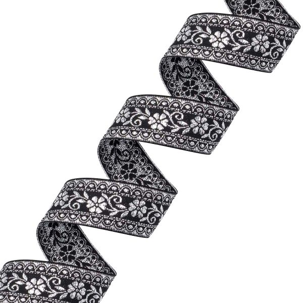 Лента (тесьма) жаккардовая 32.0 мм / 25±1 метров, с метанитом рис. 9842, черный/серебро, С3104Г17