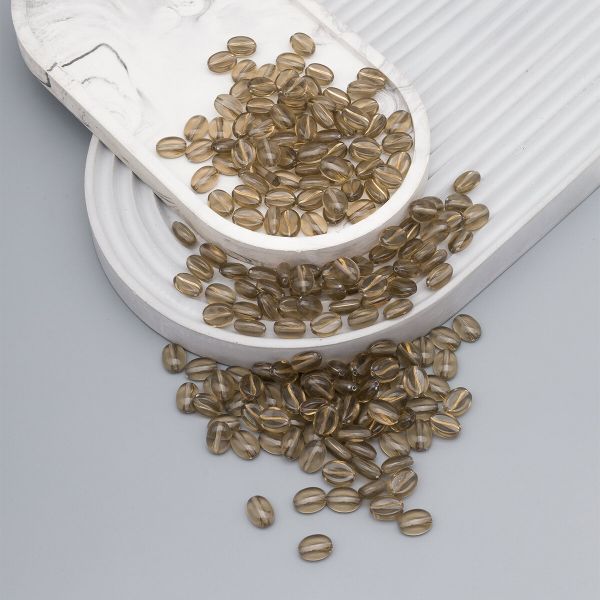 Бусины пластик 10х5 мм, 50 г, кофейное зерно, 12 прозрачное+золото, Astra&Craft, 7541