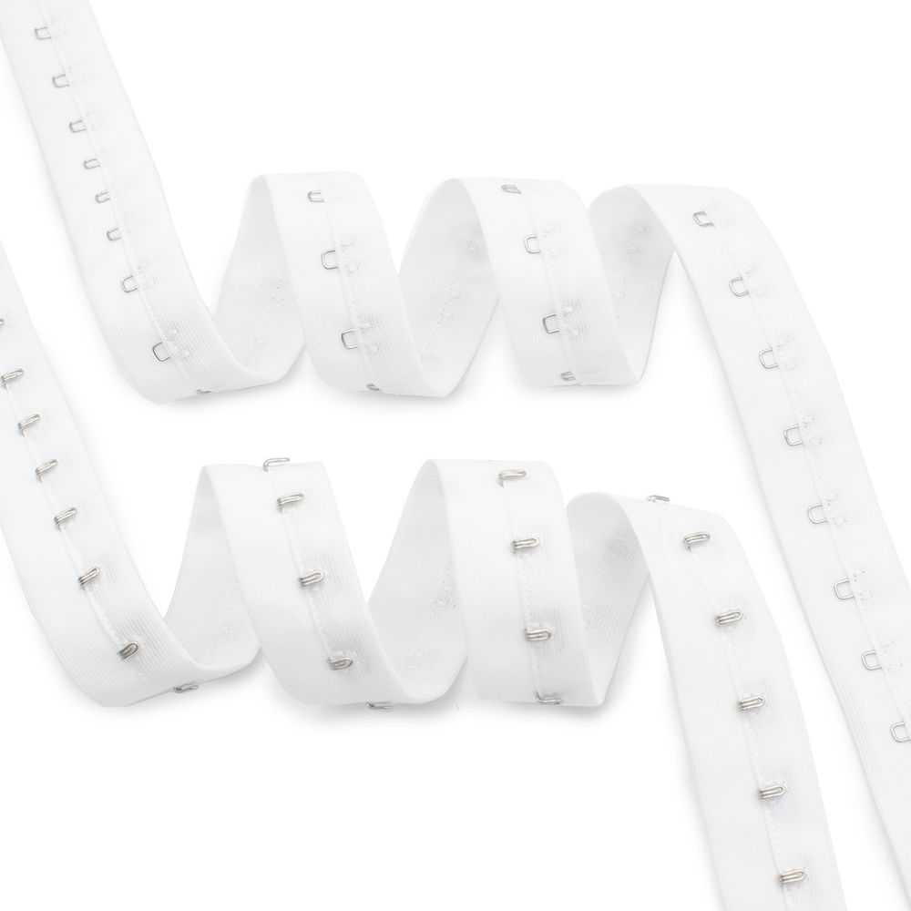 Застежки для бюстгальтера текстильные на ленте (1 ряд) 25 мм / 45.7 метра, шаг 15 мм, белый