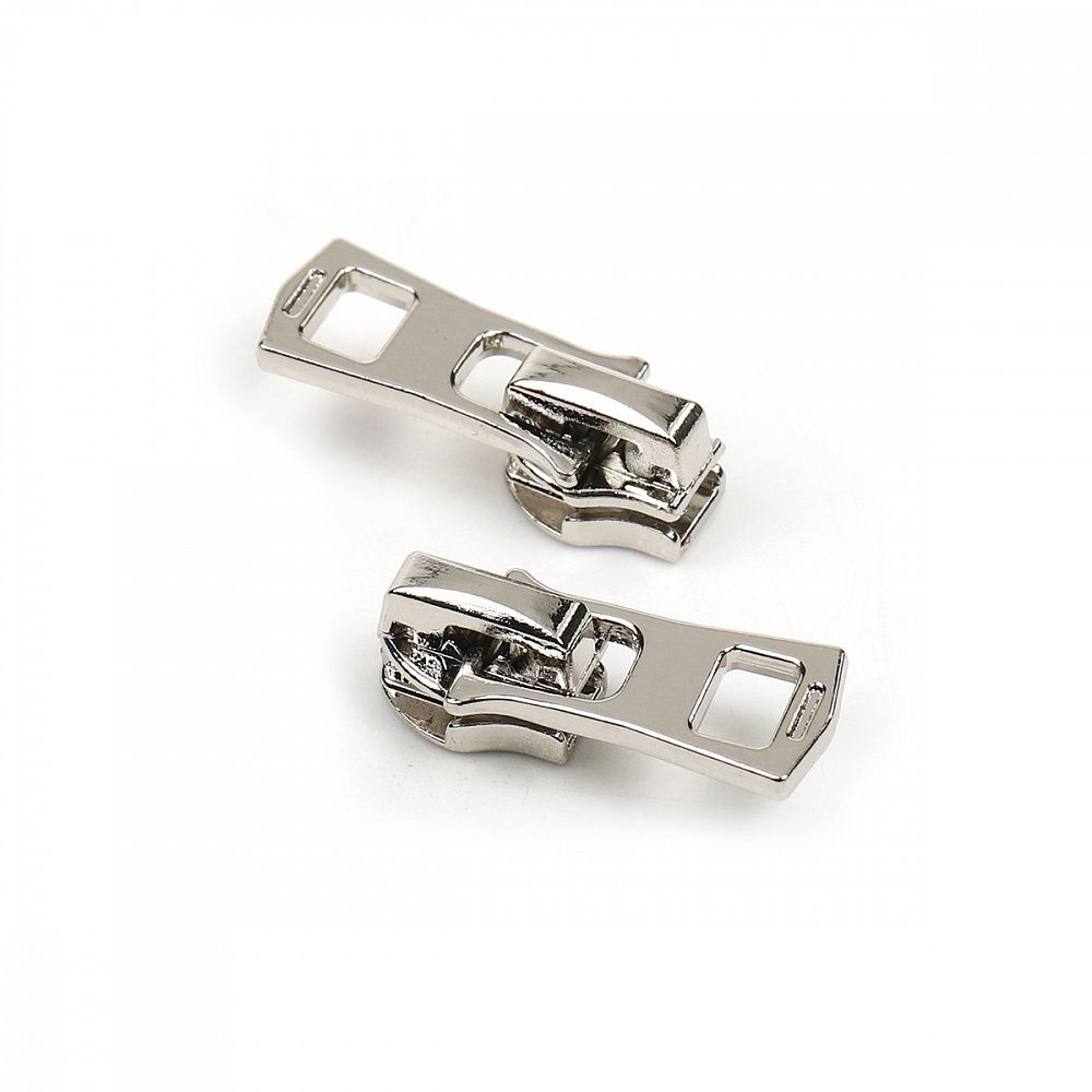 Слайдер (замок) для молнии спираль Т3 (3 мм), водонепрон./скрытой, автомат, цв.никель уп.2500 шт Слайдер (замок) для молнии спираль Т3 (3 мм), водонепрон./скрытой, автомат, цв.никель уп.2500 шт