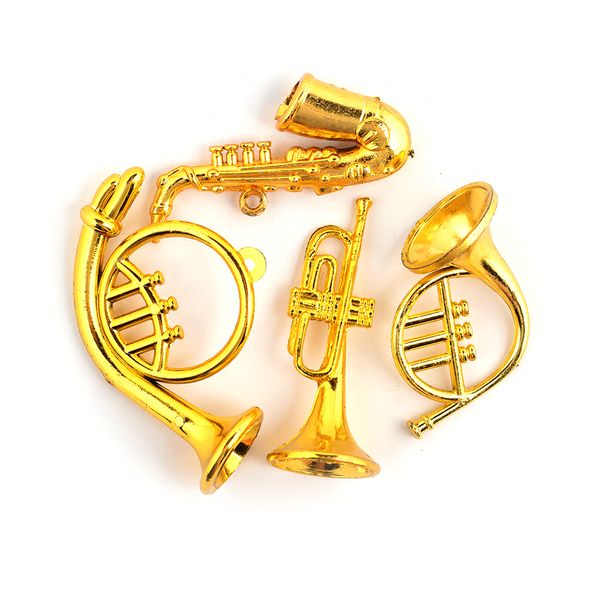 Миниатюра кукольная: Набор музыкальных инструментов, 101 пластик, цв. золото 40х70 мм, уп. 4 шт