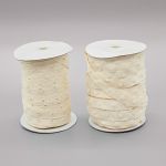 Кнопки пластиковые на тесьме (кн. ⌀ 7мм, тесьма 18 мм, шаг 1.7 см), цв.молочный, 45.7м