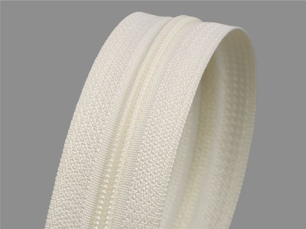 Молния рулонная витая (спираль) Т3 (3 мм) УСИЛЕННАЯ, НА БОБИНЕ, S-121 кремовая, аналог 571 (цв.SBS) / кор. 1200 метров