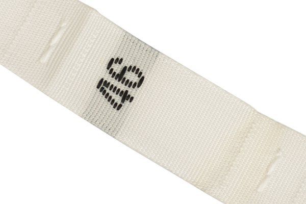 Размерники жаккардовые тафта 46 белый 10х32 мм ТВ в рул. 500 шт