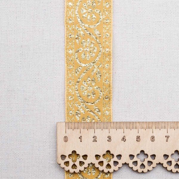 Лента (тесьма) жаккардовая 32.0 мм / 25±1 метров, с метанитом рис. 9819, желтый/золото, С3104Г17