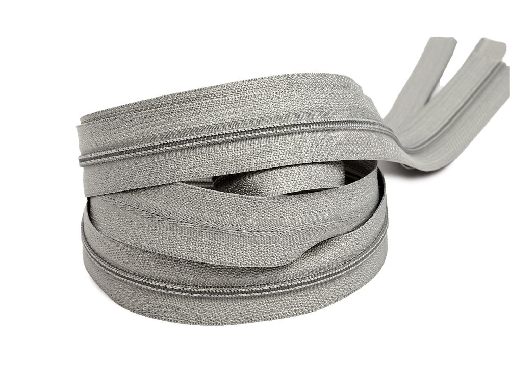 Молния рулонная витая (спираль) Т3 (3 мм), УСИЛЕННАЯ, НА БОБИНЕ, S-133 св.серый (цв.SBS) / 200 метров