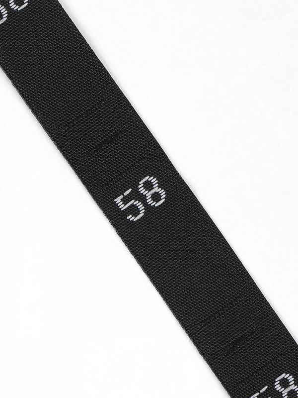 Размерники жаккардовые тафта 58 черный 10х32 мм ТВ в рул. 500 шт