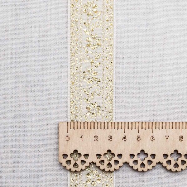 Лента (тесьма) жаккардовая 32.0 мм / 25±1 метров, с метанитом рис. 9842, белый/золото, С3104Г17