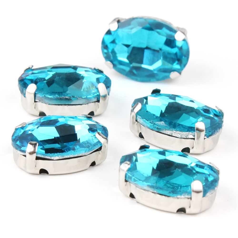 Хрустальные стразы в цапах овальной формы, голубой 10х14 мм, 5 шт., ОЦ010НН1014