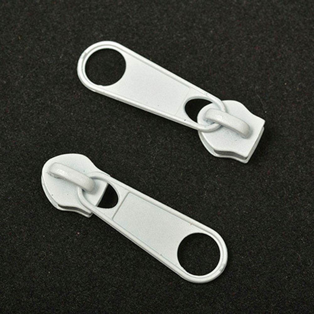 Слайдер (замок) для молнии спираль Т5 (5 мм), без фиксатора, цв.F101 белый уп.1000 шт Слайдер (замок) для молнии спираль Т5 (5 мм), без фиксатора, цв.F101 белый уп.1000 шт