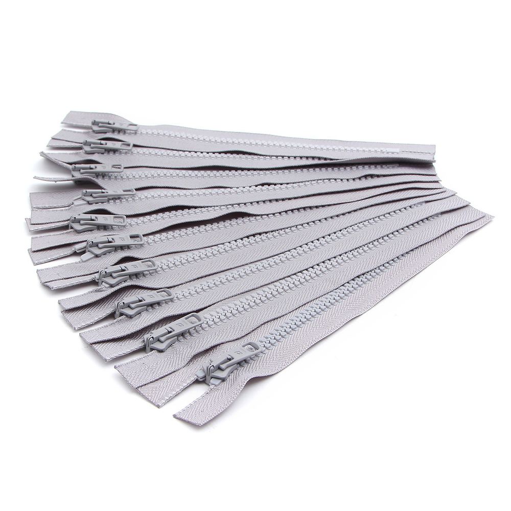 Молния трактор Arta Т6 (6 мм) 1 зам., н/раз., 18 см, цв. 079 св.серый, уп.10 шт