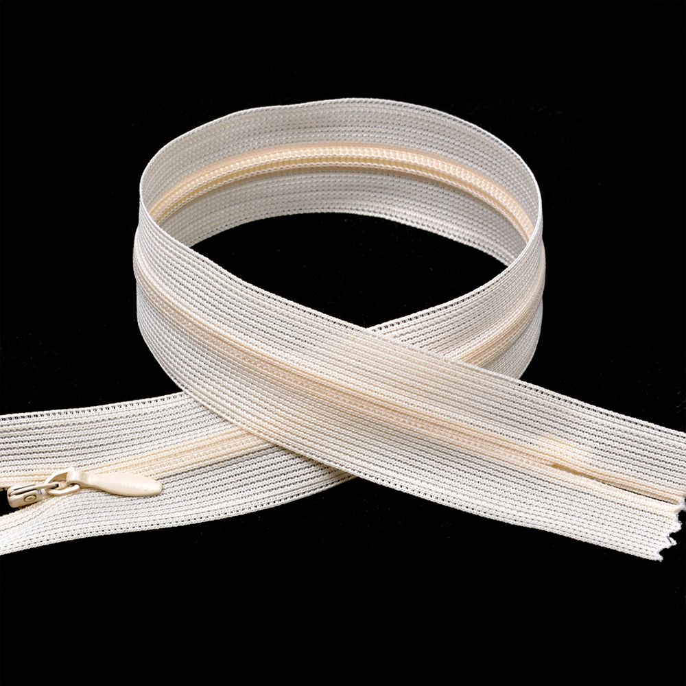 Молния потайная (скрытая) Т3 (3 мм) 1 зам., н/раз., 20 см, цв.S031 экрю уп.50 шт Молния потайная (скрытая) Т3 (3 мм) 1 зам., н/раз., 20 см, цв.S031 экрю уп.50 шт