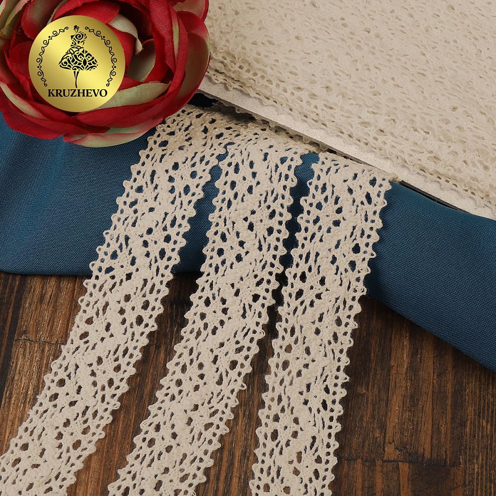 Кружево вязаное (тесьма) 25 мм, диз. 297, цв.01 натуральный, уп. 25 м, Kruzhevo