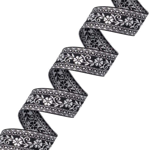 Лента (тесьма) жаккардовая 32.0 мм / 25±1 метров, с метанитом рис. 9842, черный/серебро, С3104Г17