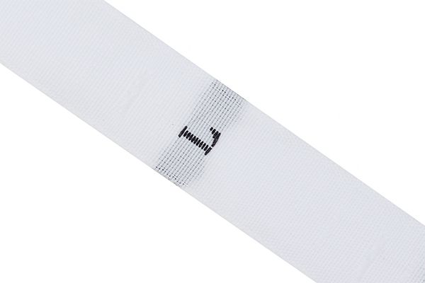 Размерники жаккардовые тафта L белый 10х32 мм ТВ в рул. 500 шт
