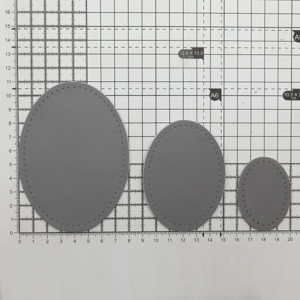 Набор заплаток пришивных из кожи, овал 4х5,5см, 6х8,2см, 8х10,9см, с перфорацией, 3 шт (07 серый), 9404