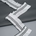 Кружево плиссированное 70 мм, / 45.72 метра, складка плиссе, цвет белый с черной окантовкой